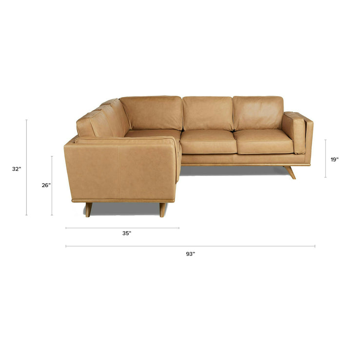 Aldermen Leather Corner Sectional in evolving patina with oak frame in modern loft