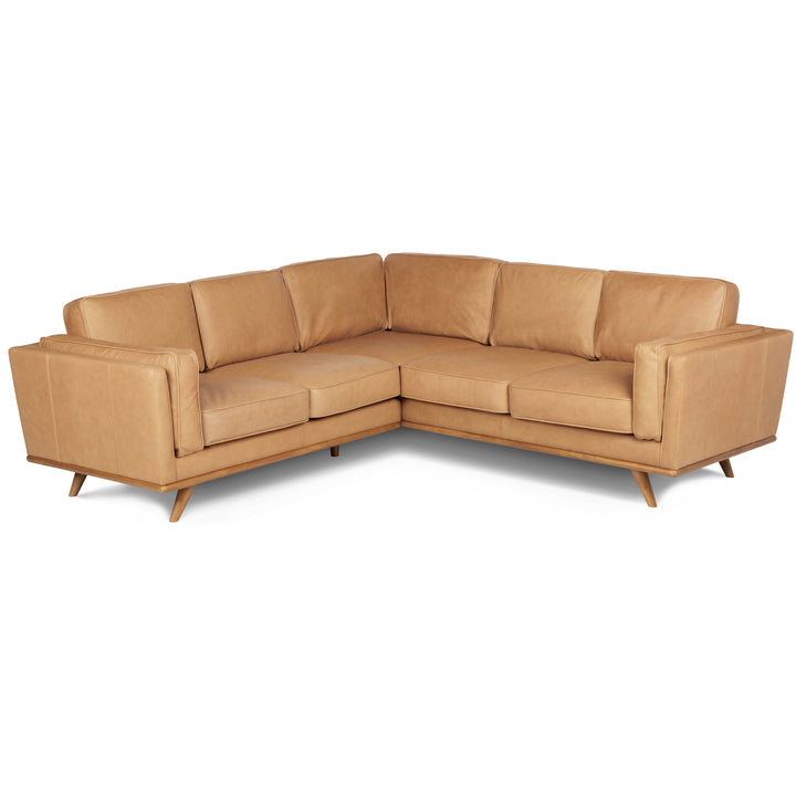Aldermen Leather Corner Sectional in evolving patina with oak frame in modern loft