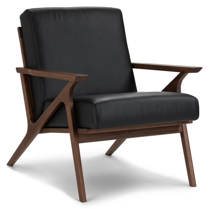Amalfi Leather Lounge Chair in home library with books and reading lamp