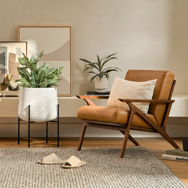 Amalfi Leather Lounge Chair in home library with books and reading lamp