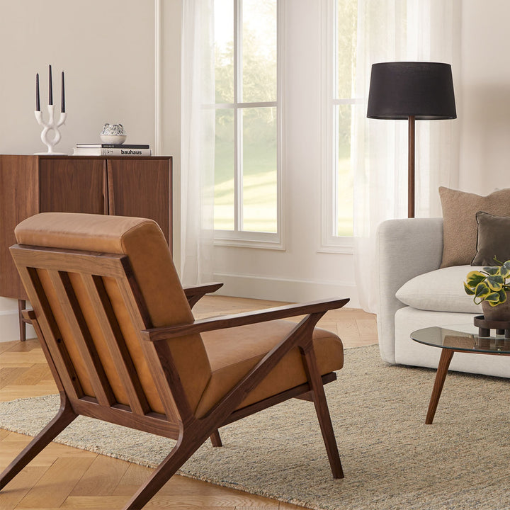 Amalfi Leather Lounge Chair in home library with books and reading lamp