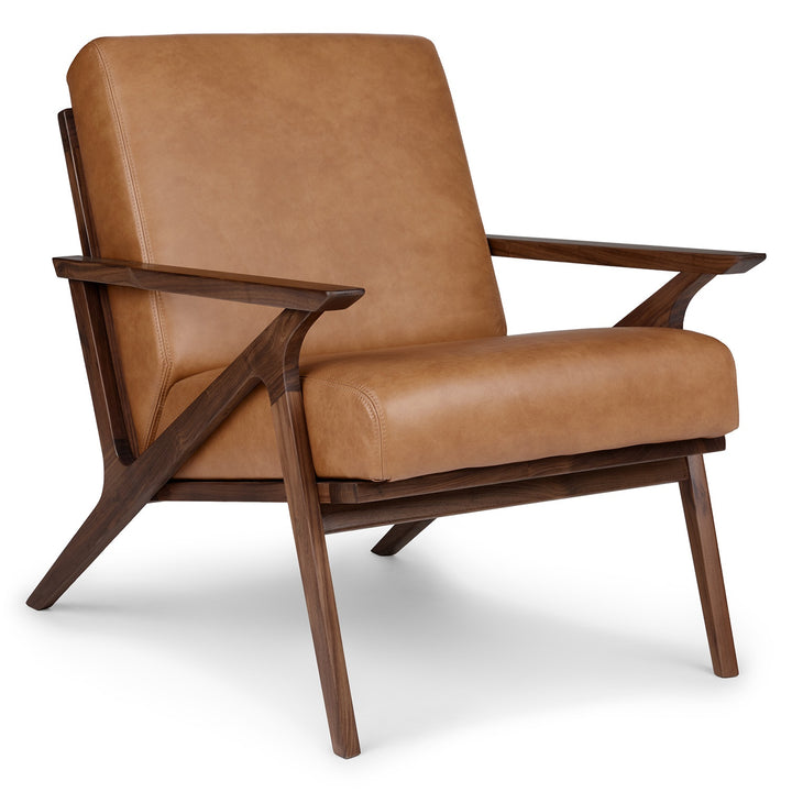 Amalfi Leather Lounge Chair in home library with books and reading lamp