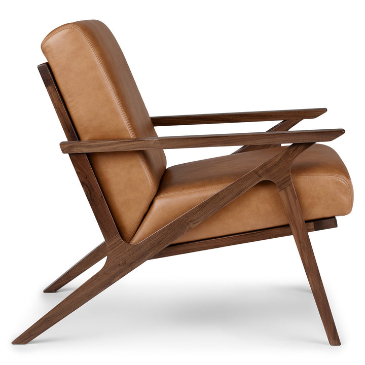 Amalfi Leather Lounge Chair in home library with books and reading lamp