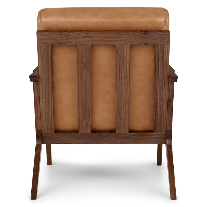 Amalfi Leather Lounge Chair in home library with books and reading lamp