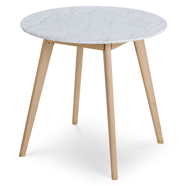 Calypso Cafe Table with marble top and wood legs in a cozy breakfast nook