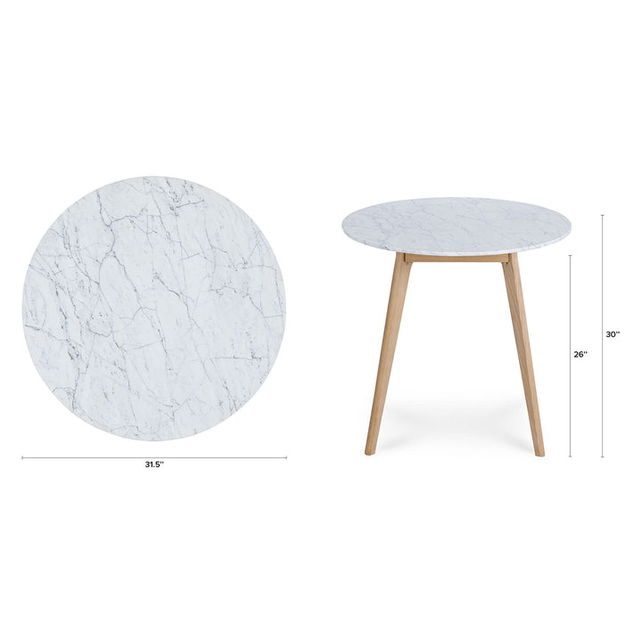 Calypso Cafe Table with marble top and wood legs in a cozy breakfast nook