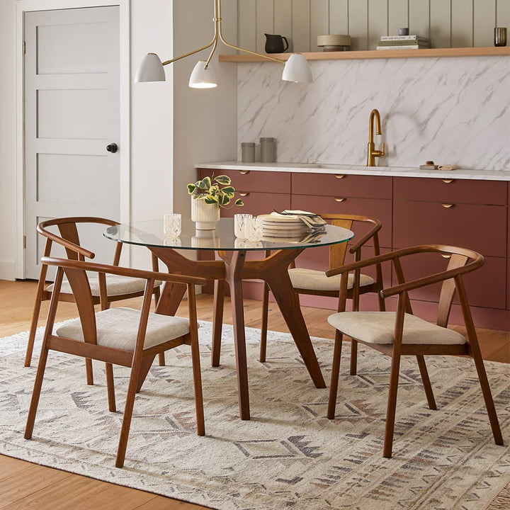 Cassiopeia Dining Chair with Y-shaped back and bentwood arms in a mid-century dining room