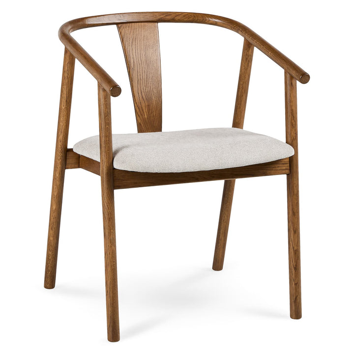 Cassiopeia Dining Chair with Y-shaped back and bentwood arms in a mid-century dining room