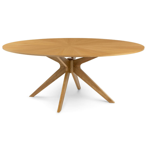 Cyrene Oval Dining Table with starburst walnut veneer in a mid-century modern dining room