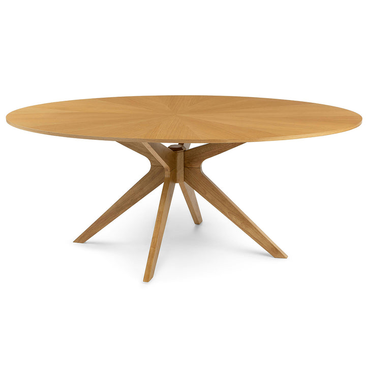 Cyrene Oval Dining Table with starburst walnut veneer in a mid-century modern dining room