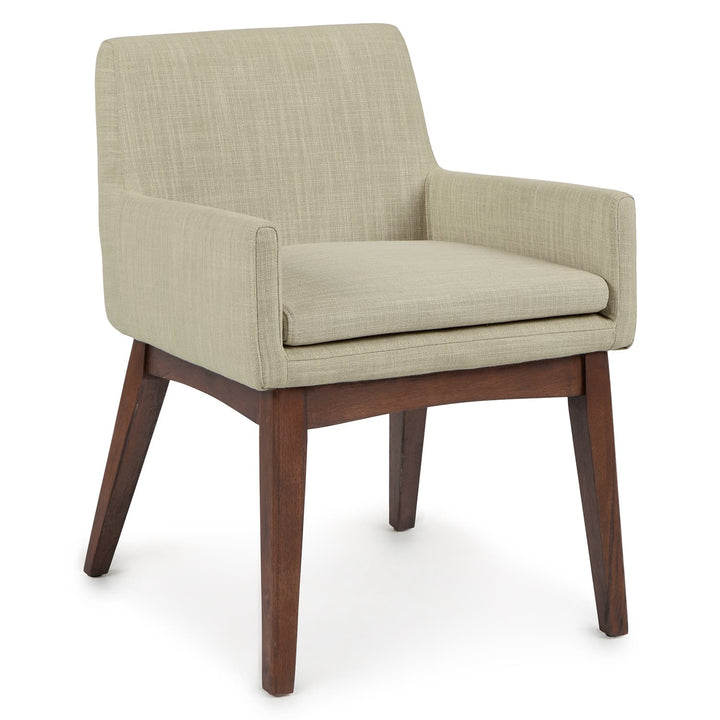 Fauces Dining Armchair pair in a modern dining room with splayed legs and upholstered seats