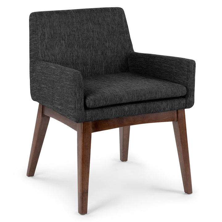 Fauces Dining Armchair pair in a modern dining room with splayed legs and upholstered seats