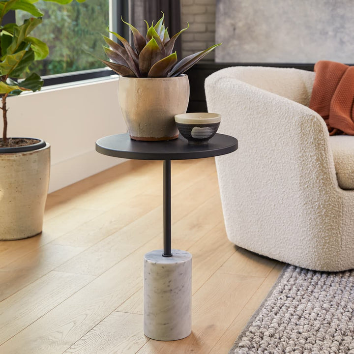 HALO Marble Side Table with brass top and veined marble base in modern living room