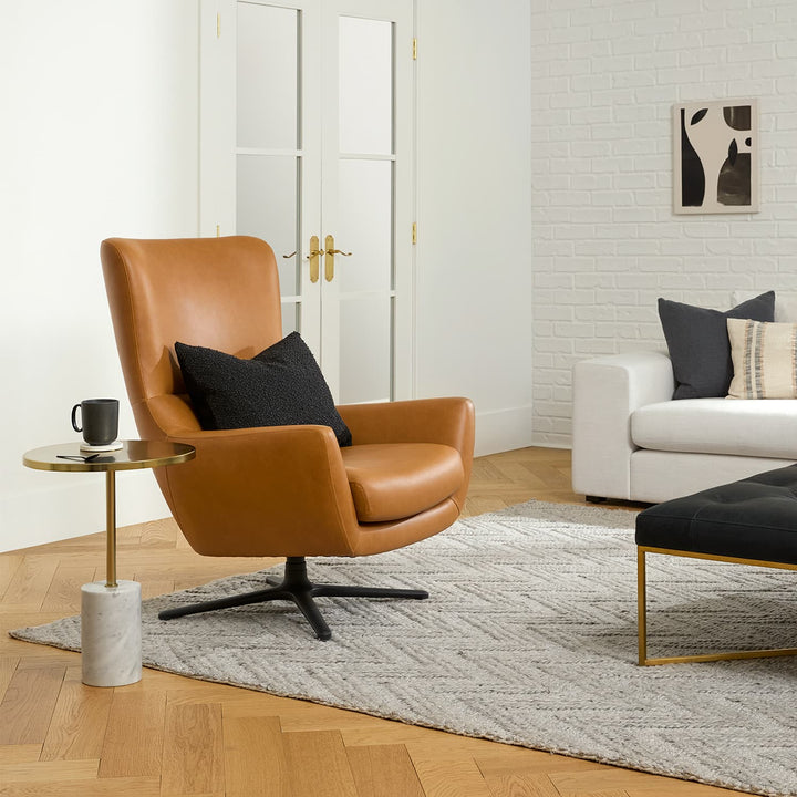 HALO Black Marble Side Table with brass top and veined marble base in modern living room