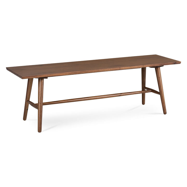 Halleberg Bench in Walnut beside the Seno Table in a modern dining area