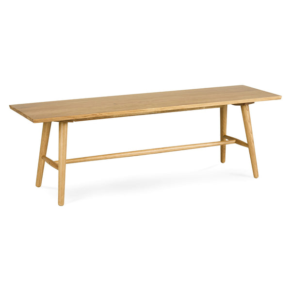 Halleberg Bench in Walnut beside the Seno Table in a modern dining area
