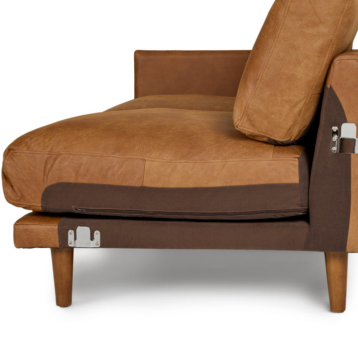 Harwell Leather Corner Sectional developing patina in mid-century modern living room