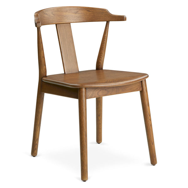 Helia Dining Chair in a farmhouse kitchen with solid wood construction and curved back