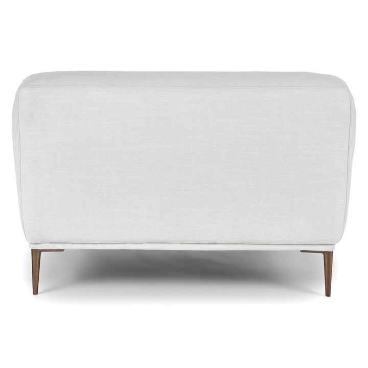 Helio Lounge Chair in quartz white with titanium legs in modern loft interior