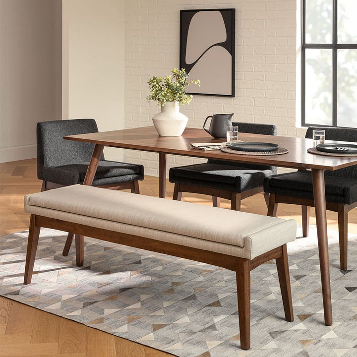Iris Dining Table in a mid-century modern dining room with solid wood legs and natural wood grain