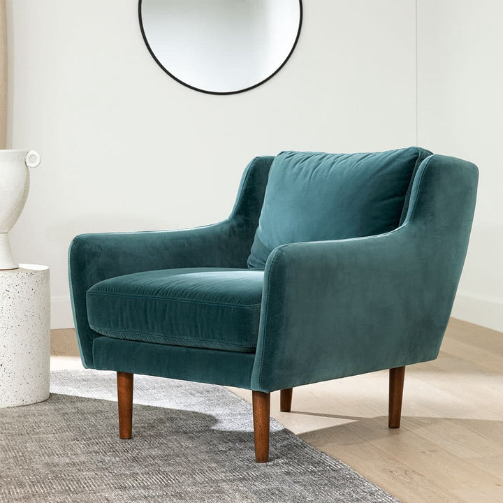 Kaleido Green Velvet Lounge Chair in cascadia blue with walnut legs in modern living room