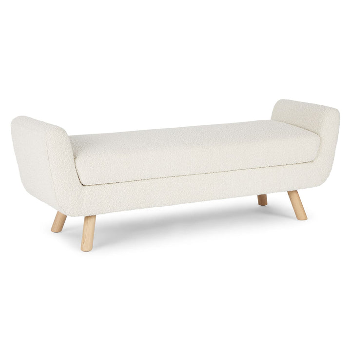 Kebne Bench with bouclé upholstery and ash wood legs in a retro-modern living room