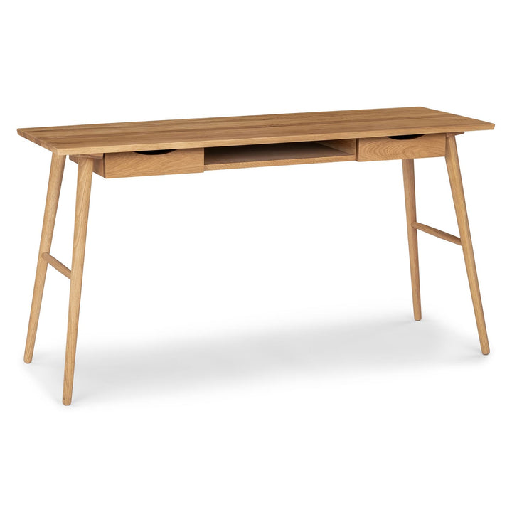 Lira Desk in a modern home office with oak finish, drawers, and keyboard shelf