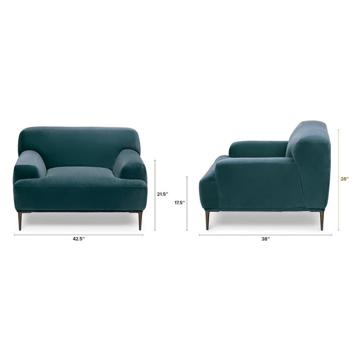 Lumina Velvet Lounge Chair in emerald velvet with titanium legs, showcasing draped-leg lounging posture