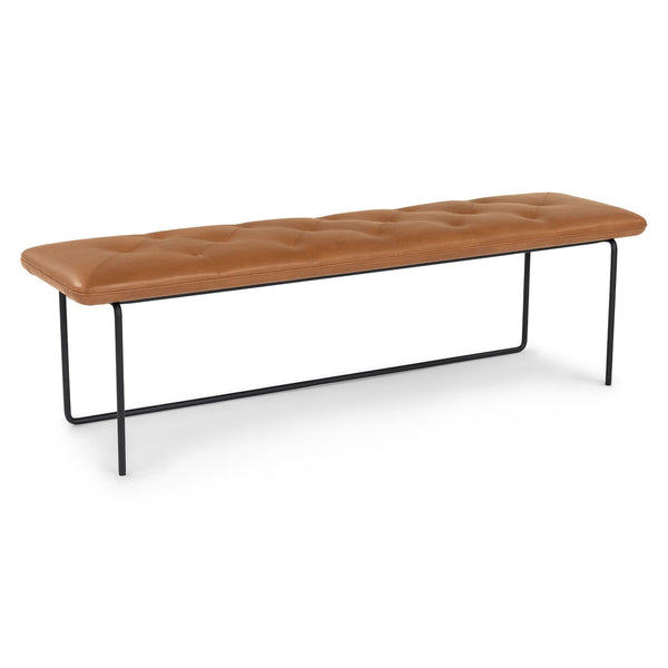 Lyngen Leather Bench with tufted Bella leather and curved steel legs in a modern dining area