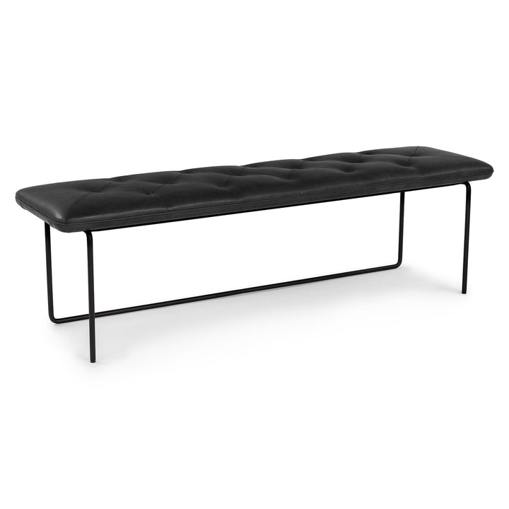 Lyngen Leather Bench with tufted Bella leather and curved steel legs in a modern dining area