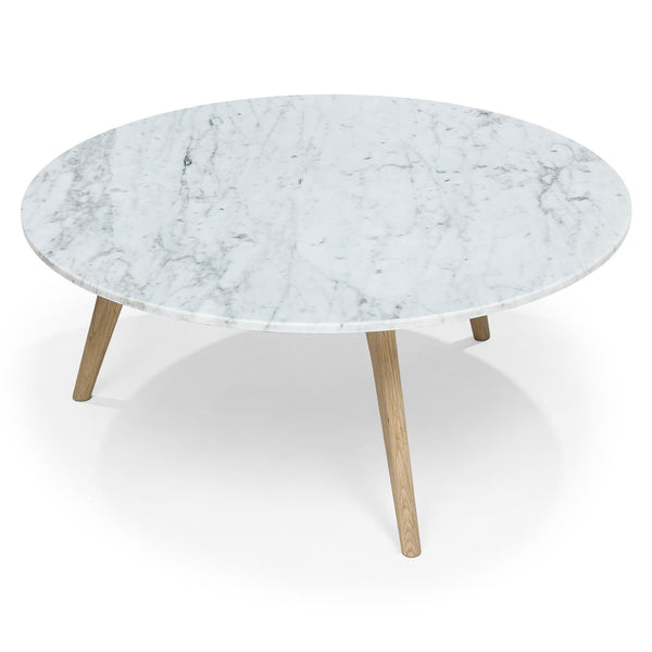 MORA Marble Coffee Table in walnut finish beside sofa with dog bed nearby