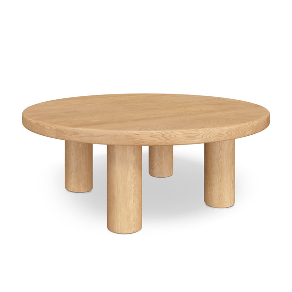 MYR Round Coffee Table in a Scandinavian-inspired living room with white oak finish and hollow legs