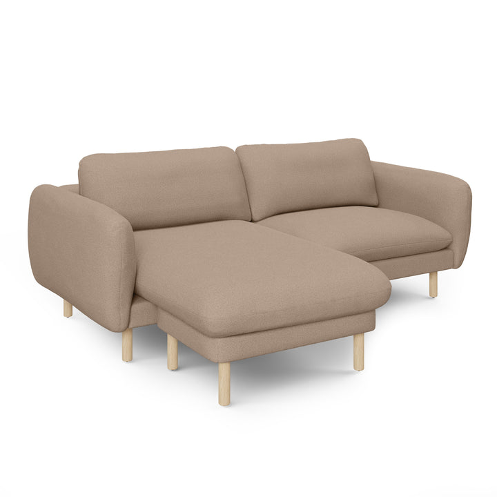 Merrick Reversible ginger sectional in left/right configurations with kids building pillow fort