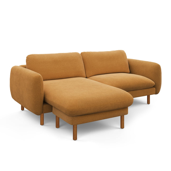 Merrick Reversible ginger sectional in left/right configurations with kids building pillow fort