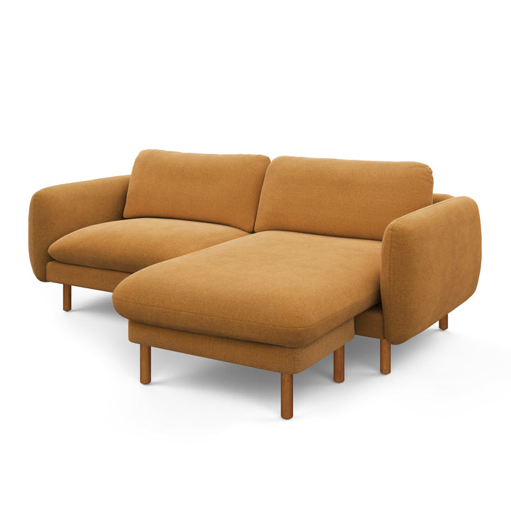 Merrick Reversible ginger sectional in left/right configurations with kids building pillow fort