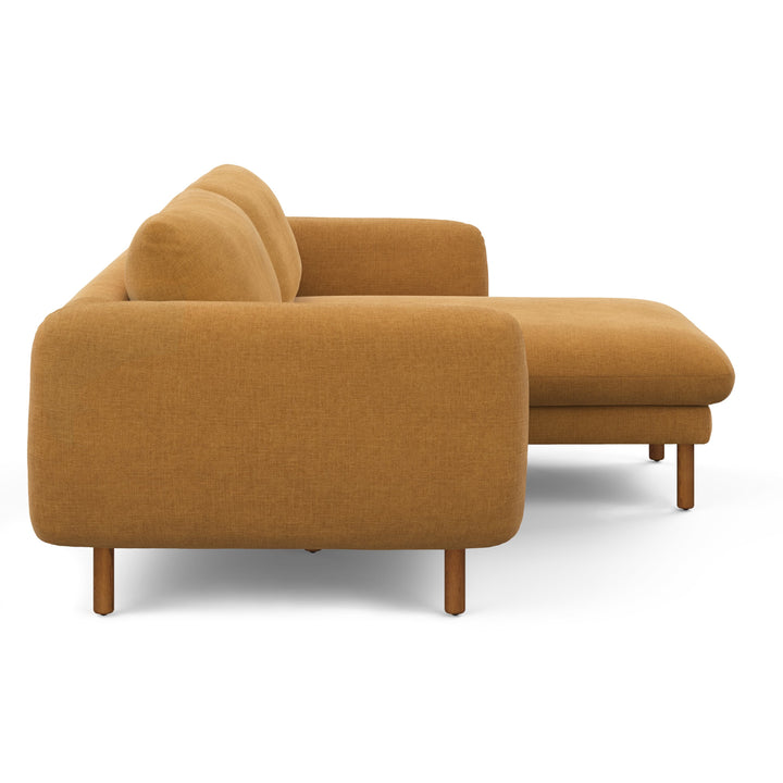 Merrick Reversible ginger sectional in left/right configurations with kids building pillow fort