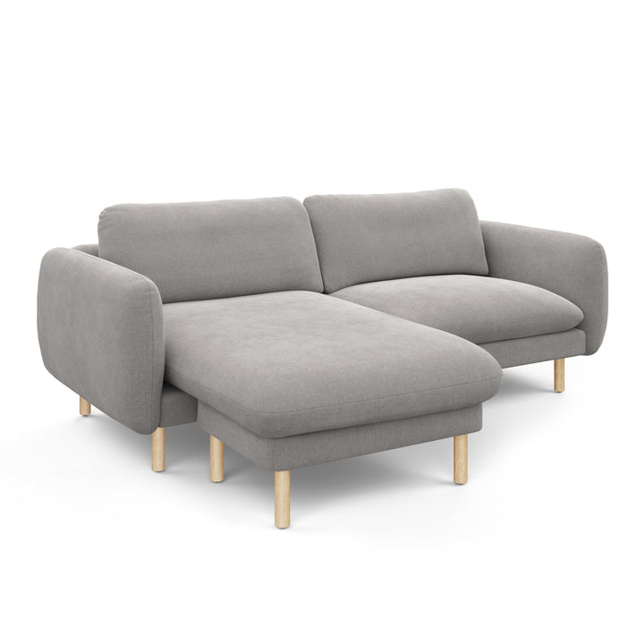 Merrick Reversible ginger sectional in left/right configurations with kids building pillow fort