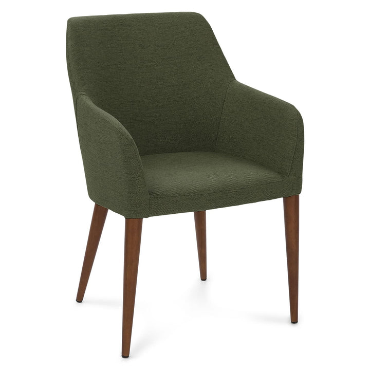 Navi Dining Chair in a modern dining room with walnut legs and upholstered seating