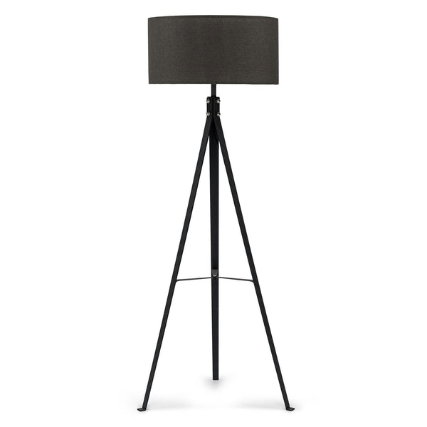 Nimba Floor Lamp in a modern living room with tripod base and linen shade