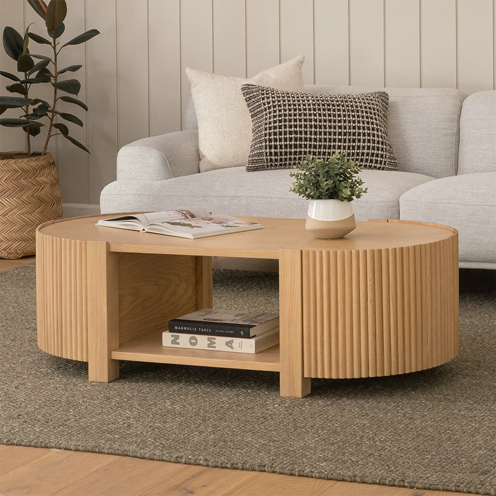 Nova Storage Coffee Table with open fluted doors revealing hidden compartments