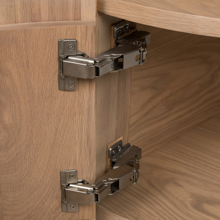Nova Storage Coffee Table with open fluted doors revealing hidden compartments