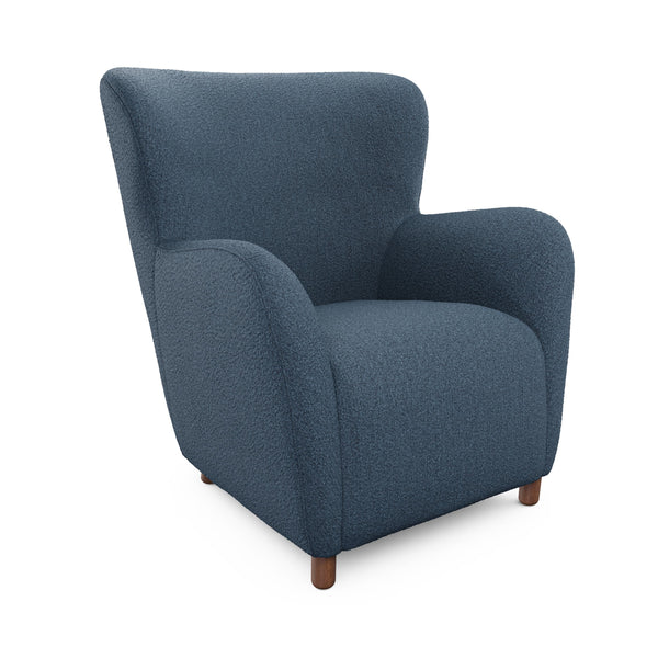 Nyx Lounge Chair in oatmeal bouclé with high backrest, two chairs facing a home theater screen