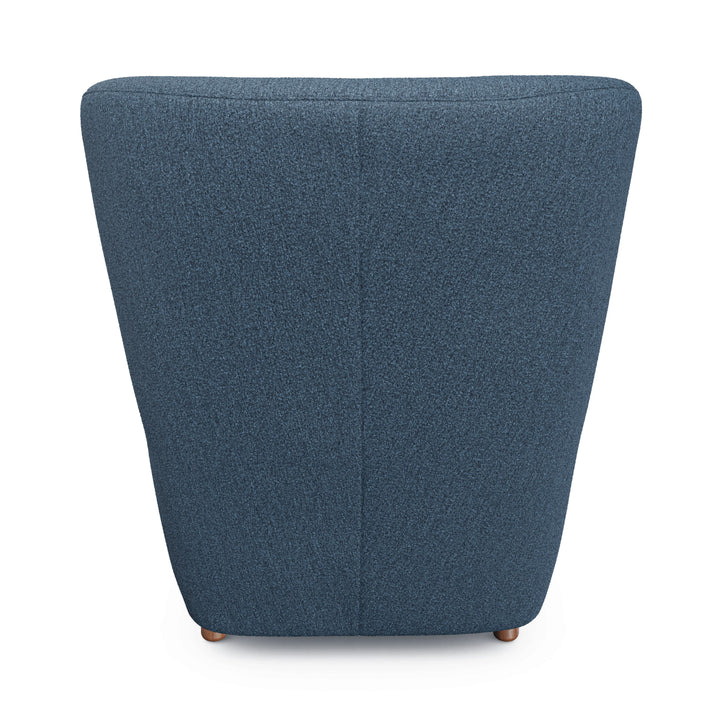 Nyx Lounge Chair in oatmeal bouclé with high backrest, two chairs facing a home theater screen