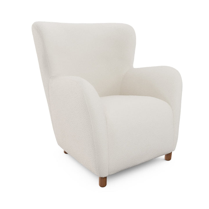 Nyx Lounge Chair in oatmeal bouclé with high backrest, two chairs facing a home theater screen