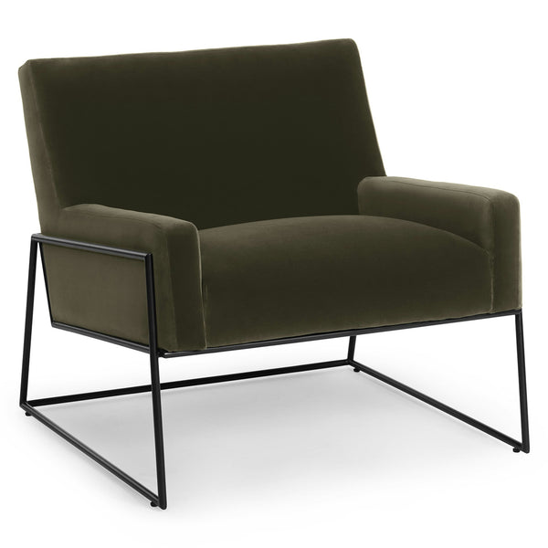 Ondine Green Velvet Lounge Chair in emerald with gold legs in a modern loft setting