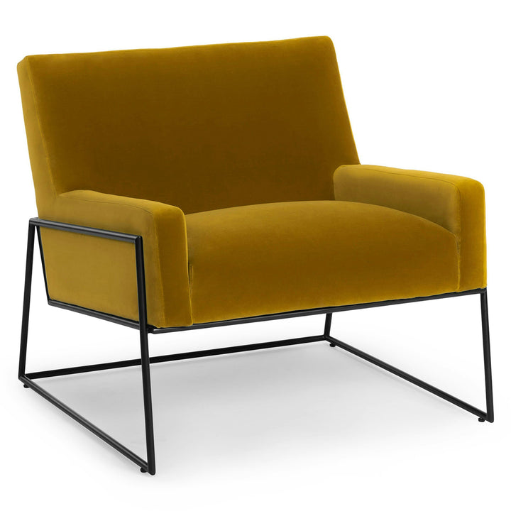 Ondine Yellow Velvet Lounge Chair in emerald with gold legs in a modern loft setting