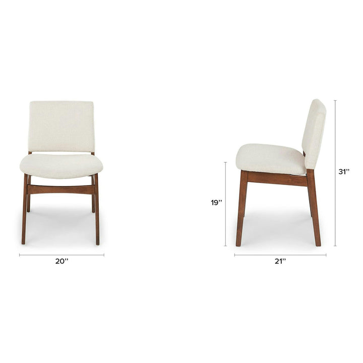 Pair of Lyra Dining Chairs in a mid-century modern dining room with textured upholstery
