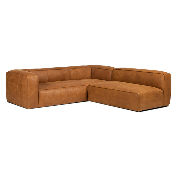 Pembroke Leather Sectional in rawhide tan with laptop in home office setting