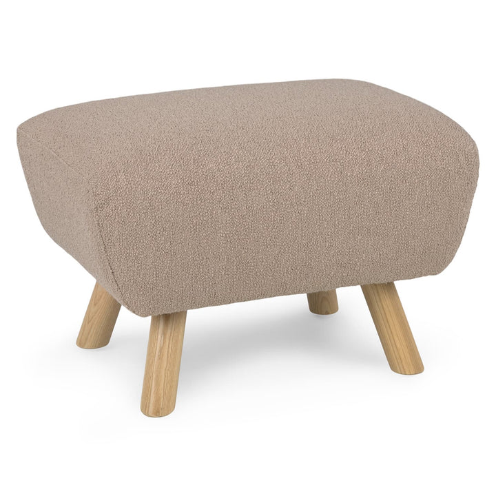 Polnatt Ottoman with bouclé upholstery and wood legs in a Scandinavian-style living room