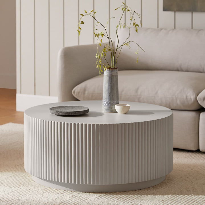 SILO Concrete Coffee Table with fluted base in industrial loft setting